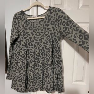 Boutique long sleeve baby doll top. Worn once. Grey and black cheetah print